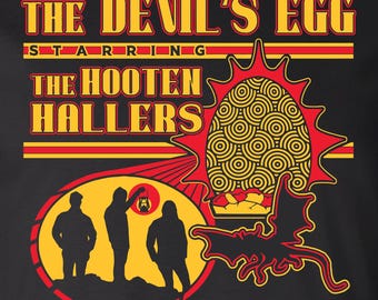 The Hooten Hallers The Devil's Egg, merchandising ufficiale per l'opera rock. Maglietta unisex nera Bella Canvas stampata.