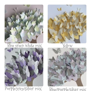 May include: Four square images showcasing paper butterfly art in various color schemes. The options include blue, green, and white; yellow; purple, grey, and silver; and blue, purple, and silver. Each design features a tree-like structure with butterfly-shaped leaves.