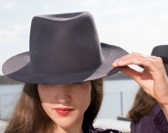 Light Fedora made of fur felt in a classic men's shape with straight brim. A handmade hat in androgynous, minimalist style. Hygo