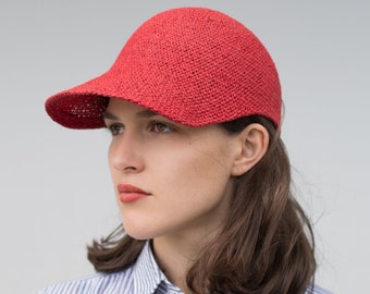 Light sporty summer cap with visor for her/him in elegant design. Handmade from air-permeable paper yarn, in the colour titian red. Ciel