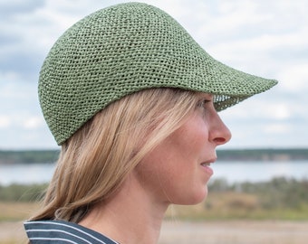 Light sporty summer cap with peak for her/him in elegant design.Handmade hat fashion from air-permeable paper yarn, in the colour khaki.Ciel