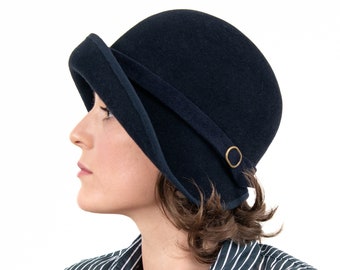 Elegant ladies' cloche with a wide brim. Handmade in the style of the 1920s, the midnight blue designer hat is a noble one-of-a-kind, LouLou
