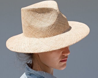 Natural colored summer fedora with wide straight brim. Handmade hat from finely woven straw, in classic shape for men & women. Vincent