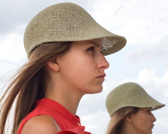 Light sporty summer cap with peak for her/him in elegant design.Handmade hat fashion from air-permeable paper yarn, in the colour reed. Ciel