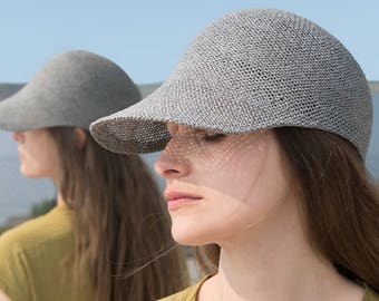 Light sporty summer cap with peak for her/him in elegant design.Handmade hat fashion from air-permeable paper yarn, in the colour grey. Ciel