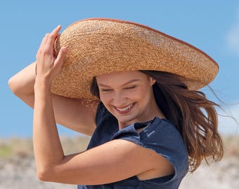 Women's straw hat with extra wide brim and round head section. Handmade purist summer hat in a delicately mottled braided pattern, Tiamo