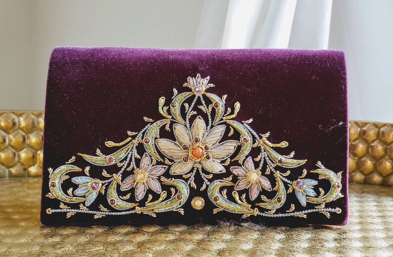 purple velvet clutch bag