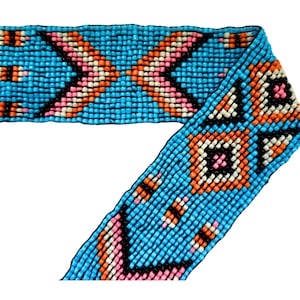 May include: A beaded trim with a geometric pattern in shades of blue, orange, pink, white, and black.