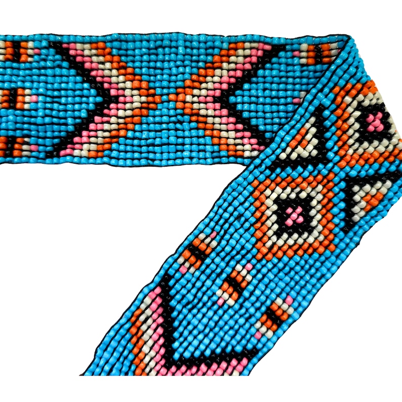 May include: A beaded trim with a geometric pattern in shades of blue, orange, pink, white, and black.