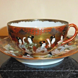 Antique Japanese Kutani Porcelain GEISHAS Cup Saucer Signed Dai Nippon Nakamura