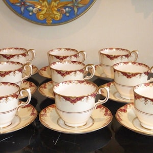 Vintage Crown Staffordshire Porcelain Set of 9 Cups and Saucers