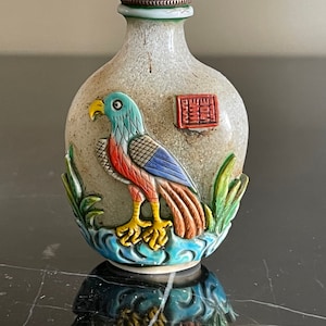 Vintage Peking Glass Snuff Bottle with Detailed Eagle Overlay Decoration