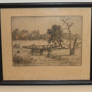 May include: A black and white etching of a rural landscape with a wooden bridge, trees, and figures in the distance.