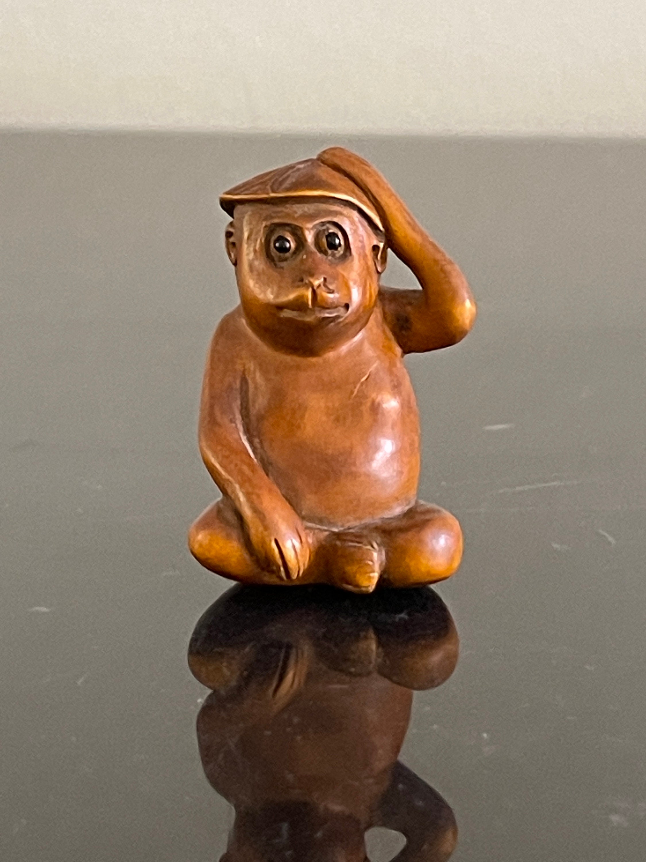 Antique Japanese Netsuke Carved Wood Seated Monkey Figurine Antique Japanese Netsuke Carved Wood Seated Monkey Figurine