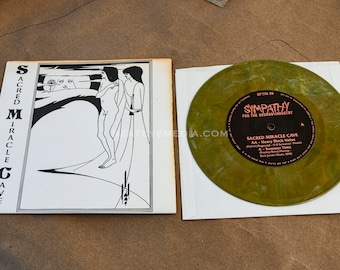Cueva del Milagro Sagrado,Sftri,RECORD,Discos,Música Industrial,Goth,PUNK,Electrónica,Ep,Lp,cds,New wave,Vinilo,Heavy Metal,grunge,Nirvana,45,7"