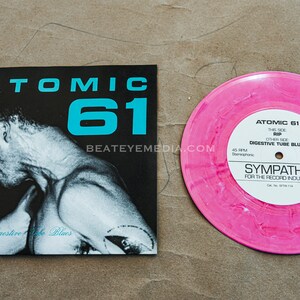 アトミック 61、レコード、レコード、インダストリアル ミュージック、ゴス、パンク、エレクトロニック、EP、LP、CD、ニュー ウェーブ、ビニール、ヘビー メタル、ポップ ミュージック、グランジ、サブ ポップ、45、7 インチ、ニルヴァーナ