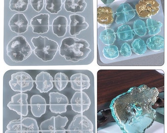 May include: Two silicone molds for making resin crafts. The molds are clear and have a textured surface. The first mold has 12 individual molds in the shape of agate slices. The second mold has 9 individual molds in the shape of agate slices. The molds are shown with finished resin pieces in the shape of agate slices.