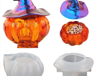 May include: A set of two silicone molds for making pumpkin-shaped candy dishes. The molds are white and feature a pumpkin shape with a witch's hat on top. The finished candy dishes are orange and clear glass with a witch's hat on top.