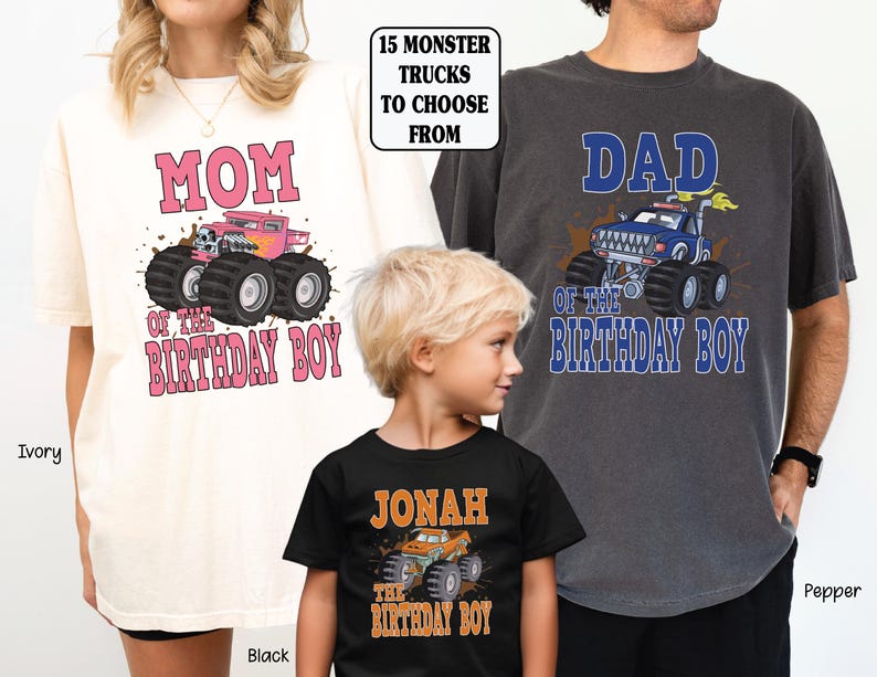 mom dad and birthday boy wearing monster truck shirts pink for mom blue for dad and orange for birthday boy.