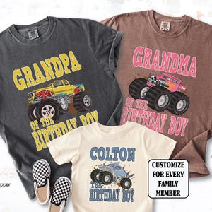 May include: Three t-shirts with monster truck graphics. One is pepper-colored with "GRANDPA OF THE BIRTHDAY BOY" in yellow text. Another is espresso-colored with "GRANDMA OF THE BIRTHDAY BOY" in pink. The third is natural-colored with "COLTON THE BIRTHDAY BOY".