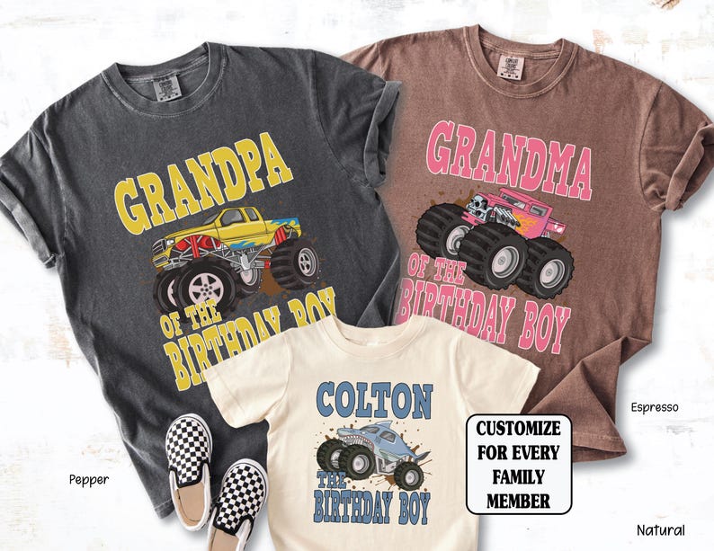 May include: Three t-shirts with monster truck graphics. One is pepper-colored with "GRANDPA OF THE BIRTHDAY BOY" in yellow text. Another is espresso-colored with "GRANDMA OF THE BIRTHDAY BOY" in pink. The third is natural-colored with "COLTON THE BIRTHDAY BOY".