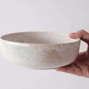 white speckled low bowl white matte glaze overlapping gloss glaze creating a subtle geometric pattern