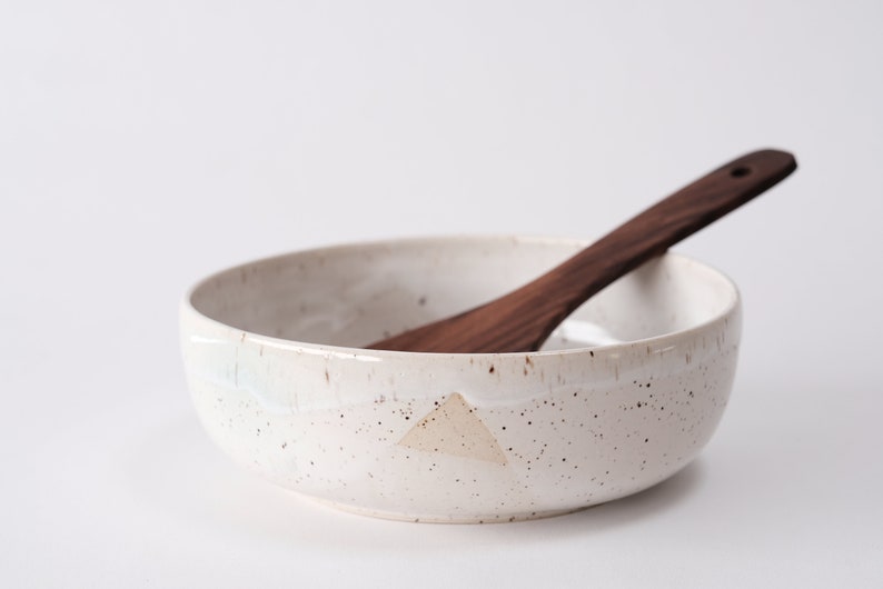 white speckled low bowl white matte glaze overlapping gloss glaze creating a subtle geometric pattern