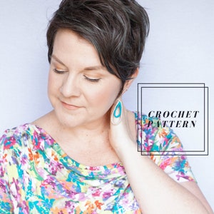 May include: A woman wearing a floral print top with a pair of turquoise and silver teardrop earrings. The image includes the text "CROCHET PATTERN".