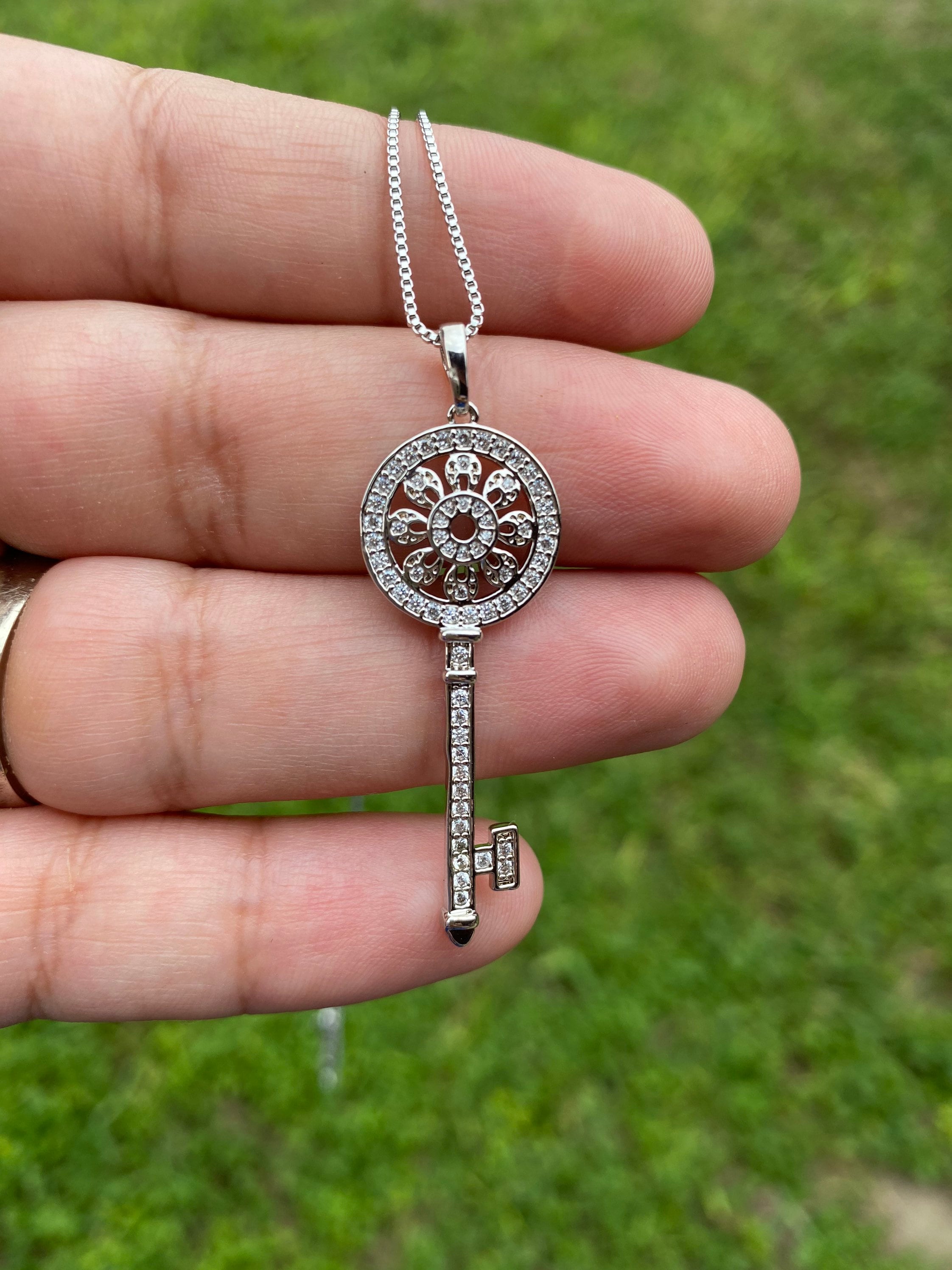 Tiffany petals key pendant deals