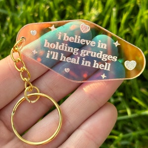 I believe in holding grudges I’ll heal in hell Iridescent Acrylic Motel Keychain