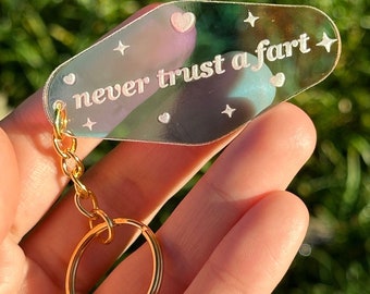 Never Trust A Fart Iridescent Acrylic Motel Keychain