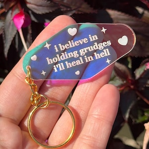 I believe in holding grudges I’ll heal in hell Iridescent Acrylic Motel Keychain
