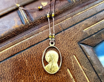 Antique Gold plated Virgin Mary silhouette  charm necklace  !