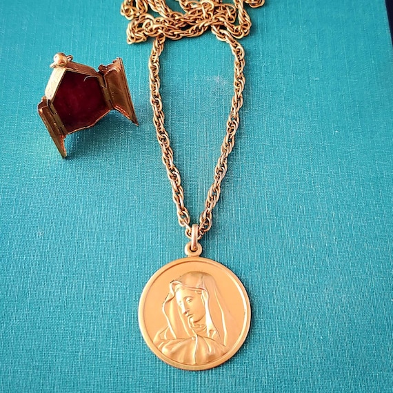 Gold plated antique Virgin Mary charm necklace  .