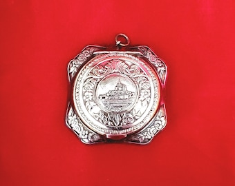 Antique Mont Saint-Michel silver compact locket  .