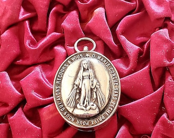 Sterling silver French Antique 19th century Virgin Mary reliquary locket .