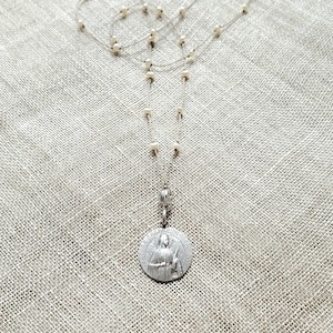 Antique French Saint Cathrine charm necklace