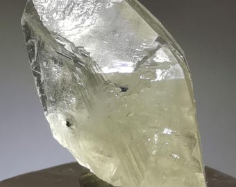 Translucent white calcite with metallic stibnite inclusion from Xikuangshan Mine Hunan Province China B3410
