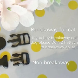 May include: Close-up of two types of black plastic clasps for collars. The text reads "Breakaway for cat. If you buy breakaway collar for dog please Do NOT attach leash to breakaway collar!! Non breakaway."