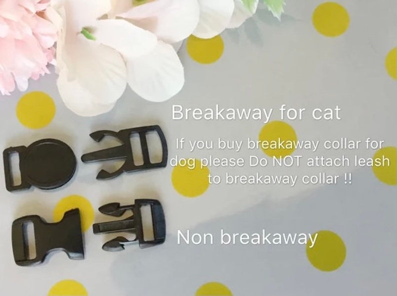 May include: Close-up of four black plastic breakaway clasps for collars. The text "Breakaway for cat" and "If you buy breakaway collar for dog please Do NOT attach leash to breakaway collar!!" is written on a white background with yellow polka dots. The text "Non breakaway" is written below the clasps.