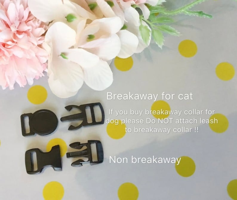 May include: Two types of black plastic clasps for collars. The top two clasps are breakaway for cats. The bottom two clasps are non-breakaway. Text reads: "Breakaway for cat. If you buy breakaway collar for dog please Do NOT attach leash to breakaway collar!! Non breakaway."