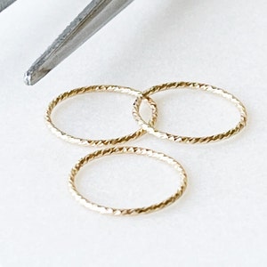 Set of three Class X Piercing Jewelry gold seamless cartilage and nose ring hoops made with 14k gold filled diamond-cut 20 gauge wire