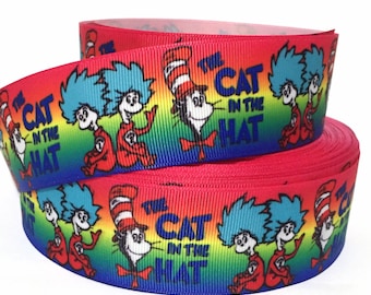 May include: Red, blue, and yellow ribbon with a rainbow gradient and a repeating pattern of "The Cat in the Hat" characters.