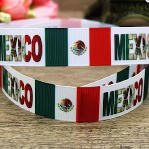 May include: White ribbon featuring the word "MEXICO" in red and green letters. The ribbon design incorporates the colors of the Mexican flag: green, white, and red. The Mexican coat of arms is also visible.