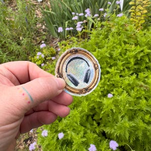 2" zwarte glitterkoptelefoon - sticker - Patreon Audio - audiocitaat