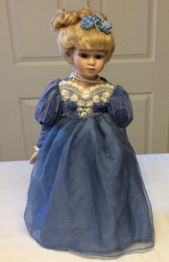 porcelain doll blue dress