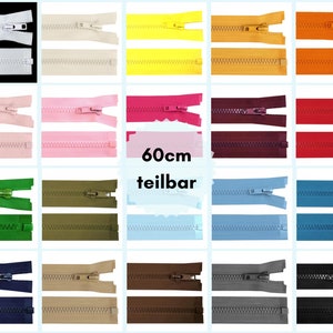 Könnte beinhalten: Sortiment an 60 cm Reißverschlüssen in verschiedenen Farben, darunter Weiß, Beige, Gelb, Orange, Rosa, Rot, Grün, Braun, Blau, Grau und Schwarz. Die Reißverschlüsse sind alle getrennt und in Reihen angeordnet. Der Text "60cm teilbar" ist in der Mitte des Bildes sichtbar.