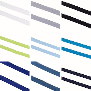 Könnte beinhalten: Zwei Reihen elastischer Besätze in verschiedenen Farben mit einem gewellten Rand. Die Farben sind Weiß, Grau, Schwarz, Hellgrün, Hellblau, Türkis, Dunkelblau und Blau.