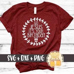 May include: Red t-shirt with a white circle design that says "Go Jesus it's your birthday". The circle has a wreath around it and a small gift box inside. The shirt has the text "SVG + DXF + PNG" and a logo that says "Cheese Toast Digitals".