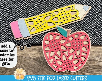 May include: Two laser cut wooden shapes, an apple and a pencil, with intricate floral designs. The apple is red and the pencil is yellow with a pink eraser. The text "SVG FILE FOR LASER CUTTERS" is at the bottom of the image.